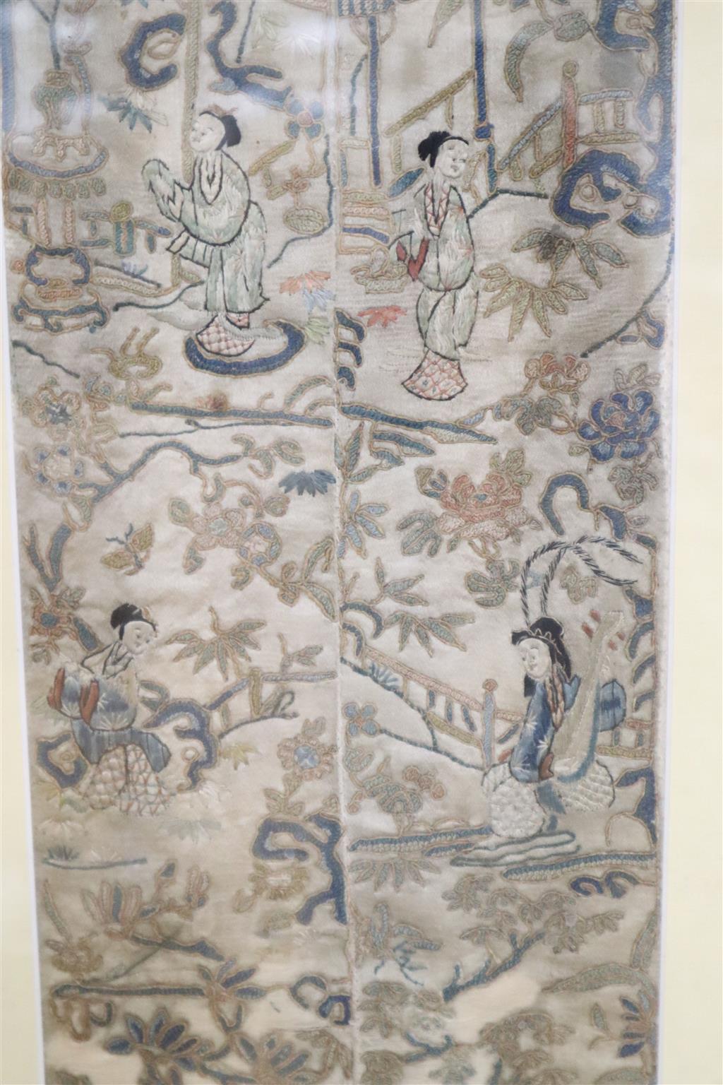 A Chinese embroidered sleeve, 15 x 47cm, framed